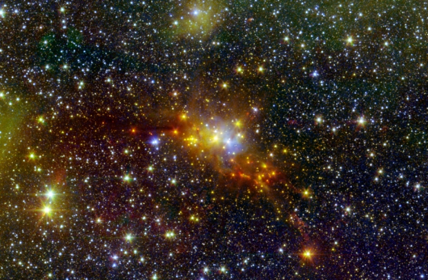 Serpens Nebula in infrared. Some of the youngest stars in the Milky Way are seen in yellow and red, in this recent image taken by NASA’s Spitzer Space Telescope. Image credit: NASA/JPL-Caltech/2MASS 